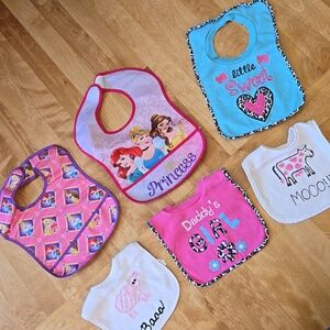 Bundle of bibs for baby girl